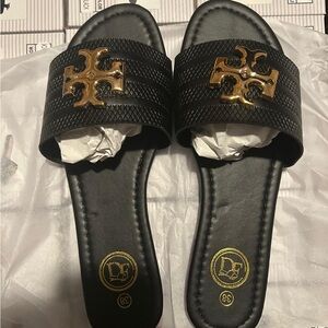 Women’s Black Slide Sandals with Gold Logo Accent